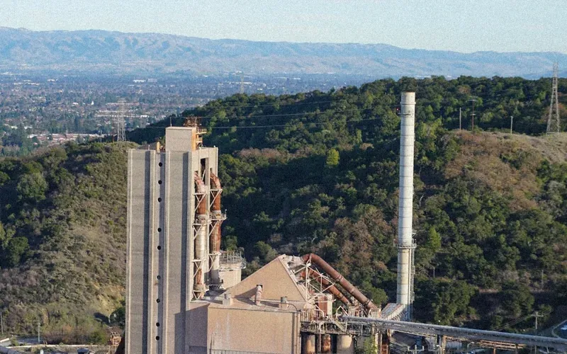 Cement works with preheater tower in the hills